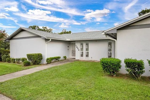 a house view with a garden space