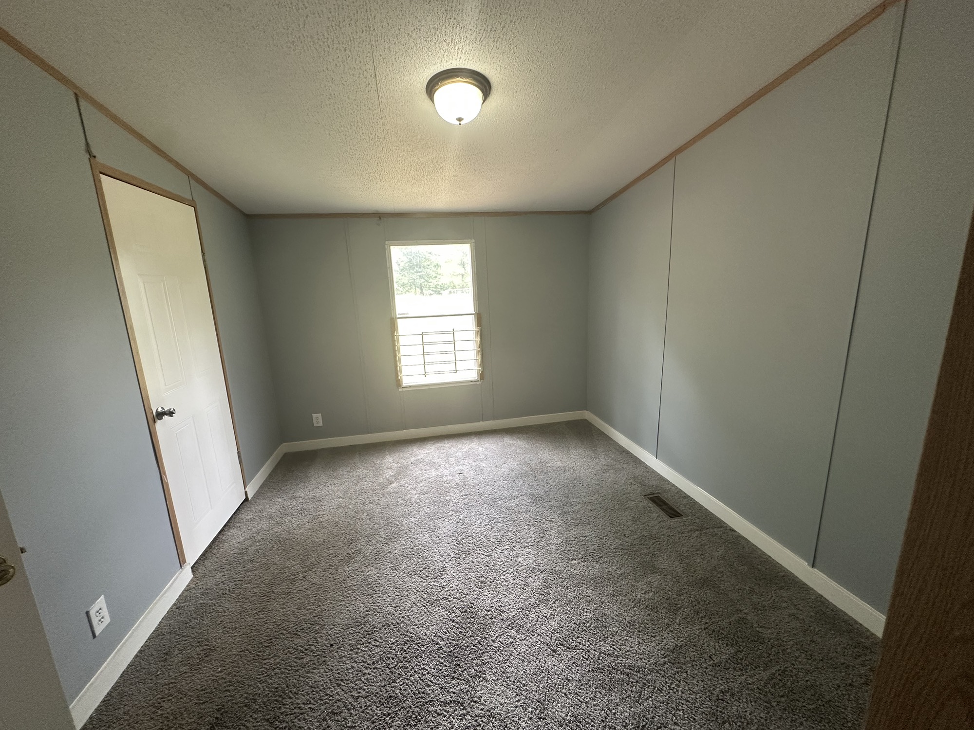 2229 Meekins Road Cleveland, TX 77328 - Photo 30 of 48 an empty room with a window