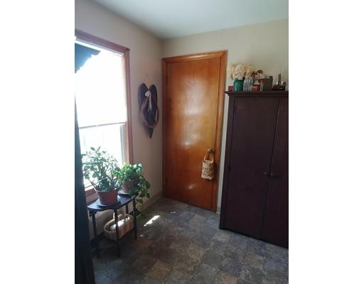 512 Hardwick Road Hardwick, MA 01031 - Photo 15 of 41 a room with painting and a potted plant
