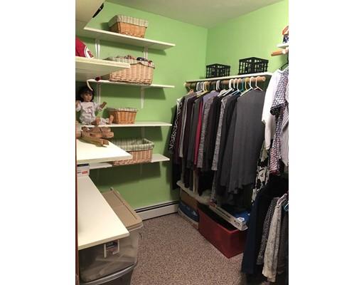 512 Hardwick Road Hardwick, MA 01031 - Photo 32 of 41 a view of walk in closet with clothes and shoes