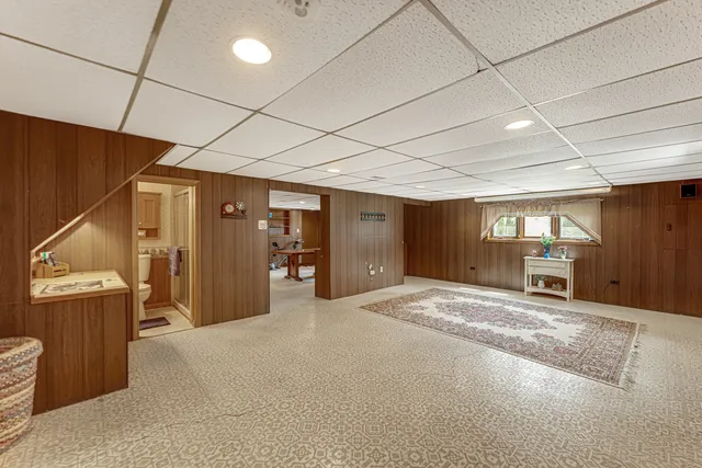 a big room with closet and windows