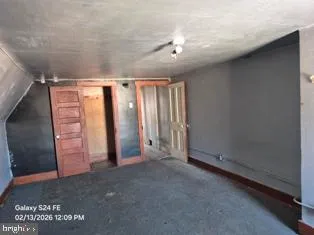 a view of hallway with washer and dryer