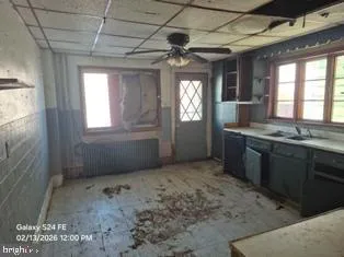a view of a kitchen and a sink