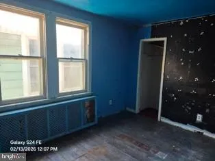 a bathroom with a toilet and a bathtub