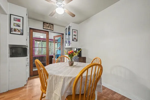 a kitchen with stainless steel appliances granite countertop a refrigerator a stove and a sink