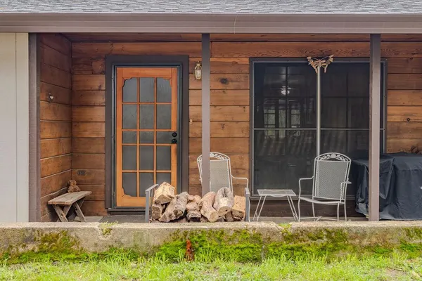 a backyard of a house with seating space