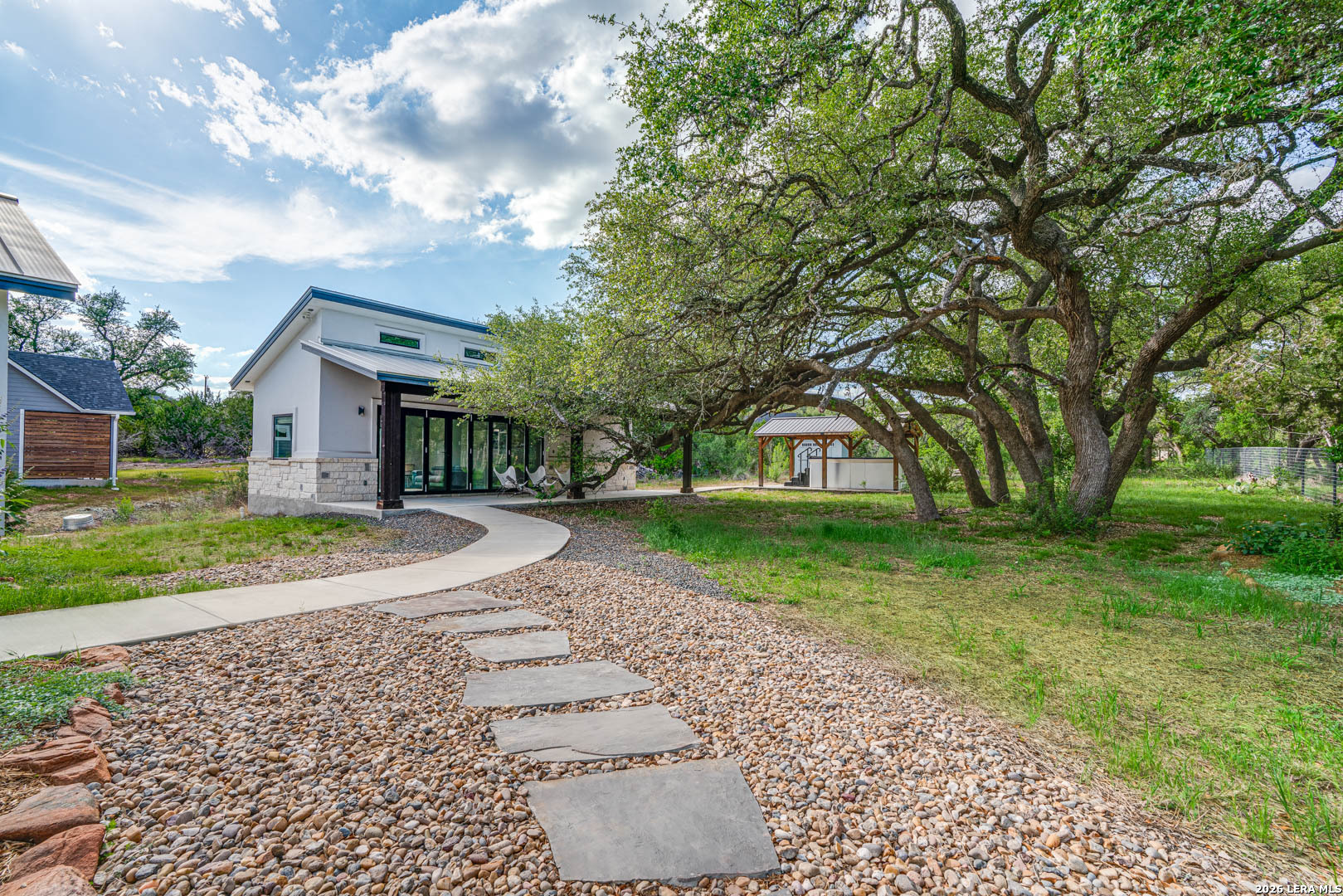 316 Prairie Tea Lane Spring Branch, TX 78070 - Photo 23 of 38 a view of a house with a yard