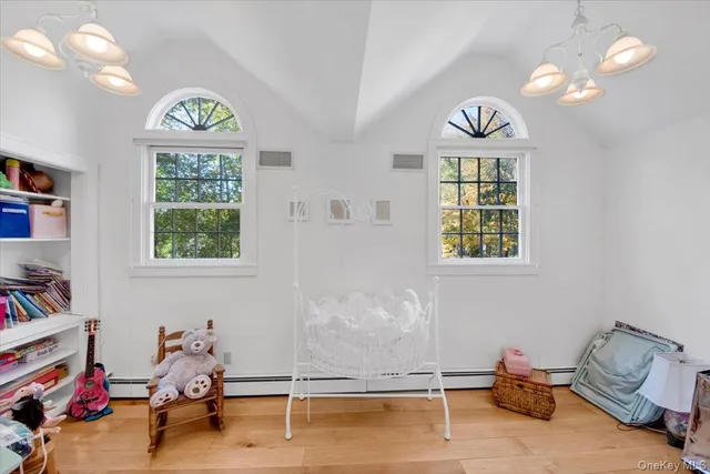 a view of a patio with a table and chairs