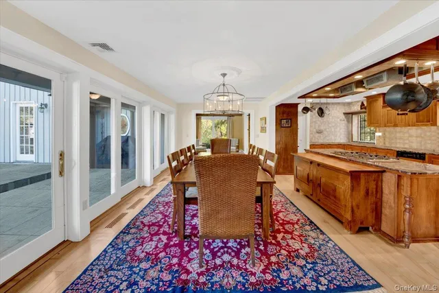 a living room with a couch and a rug