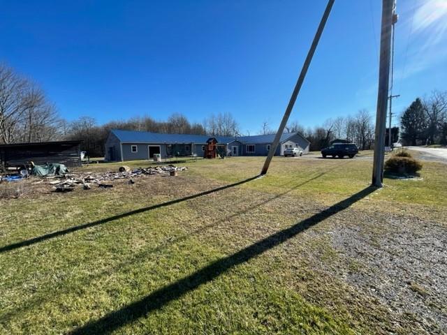 38 Old Mercer Road Volant, PA 16156 - Photo 3 of 25 a view of a yard with a table and chairs