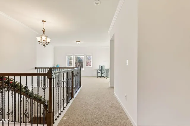 an aerial view of a house with outdoor space