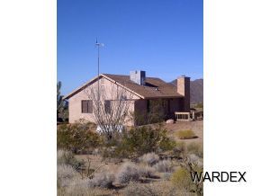 16550 Alamo Road Yucca, AZ 86438 - Photo 4 of 23 a house view with a outdoor space