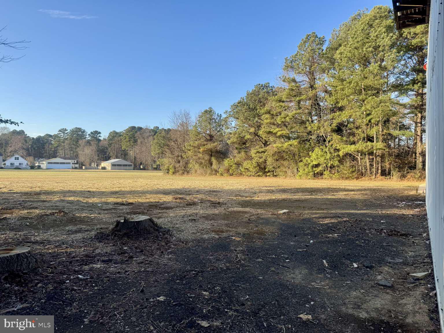 905 Crystal Rock Road Lusby, MD 20657 - Photo 19 of 22 a view of a field with an ocean beach