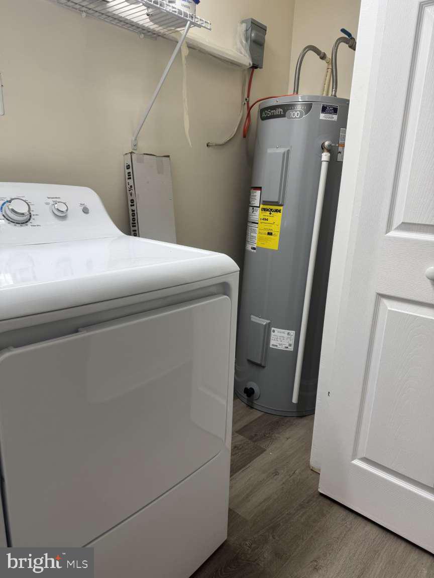 905 Crystal Rock Road Lusby, MD 20657 - Photo 22 of 22 a utility room with dryer and washer