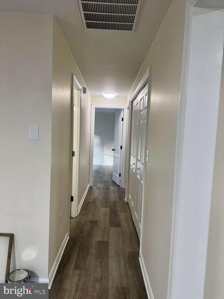 905 Crystal Rock Road Lusby, MD 20657 - Photo 7 of 22 a view of hallway with windows