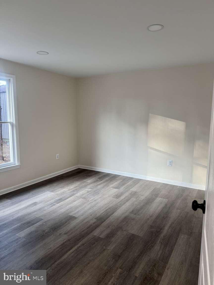 905 Crystal Rock Road Lusby, MD 20657 - Photo 8 of 22 wooden floor in a room