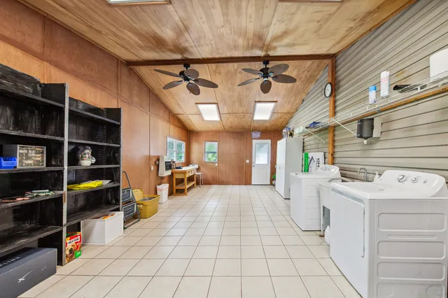 a view of a room with wooden walls