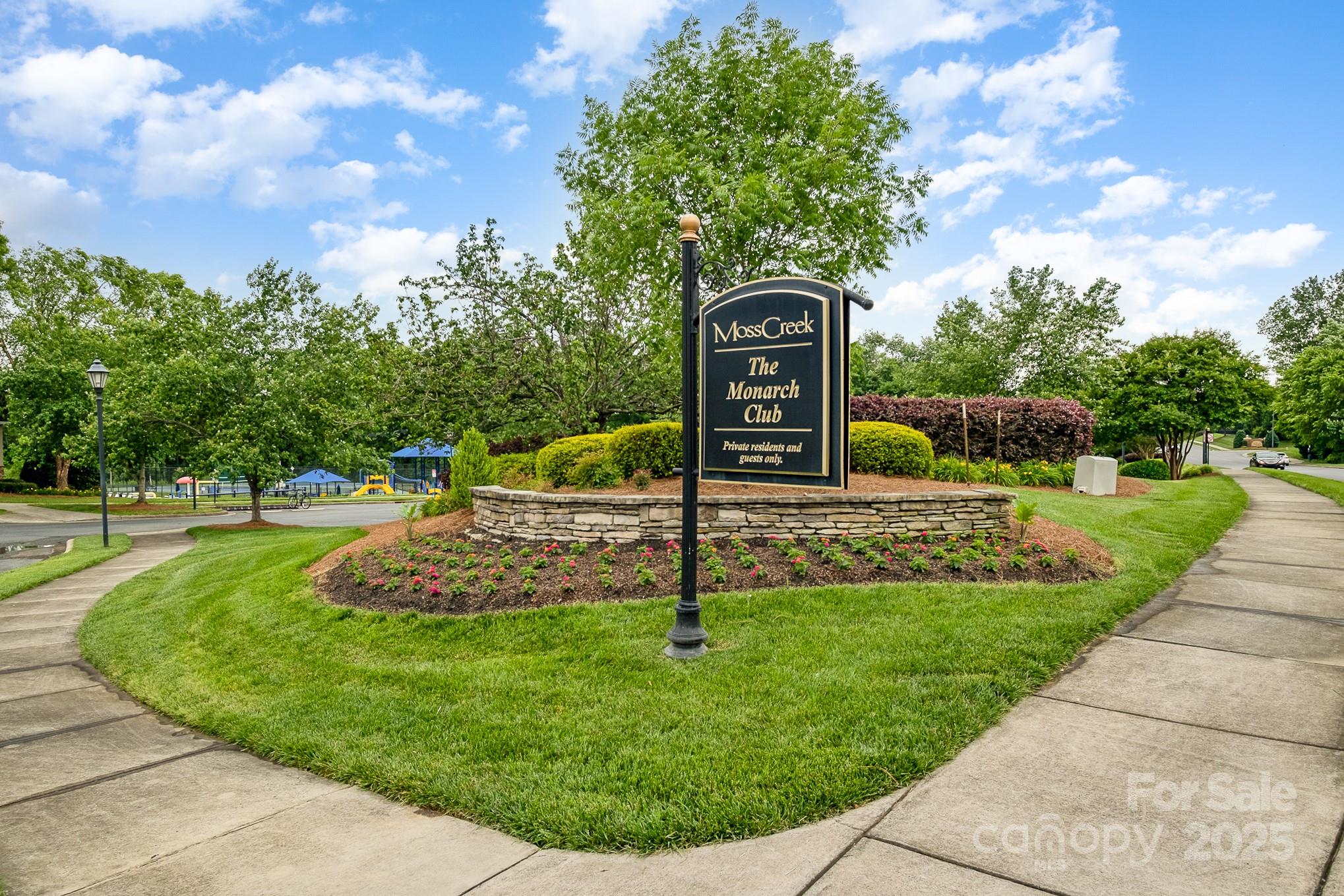 1457 Prestbury Road Northwest Concord, NC 28027 - Photo 19 of 19 a street view with tall trees
