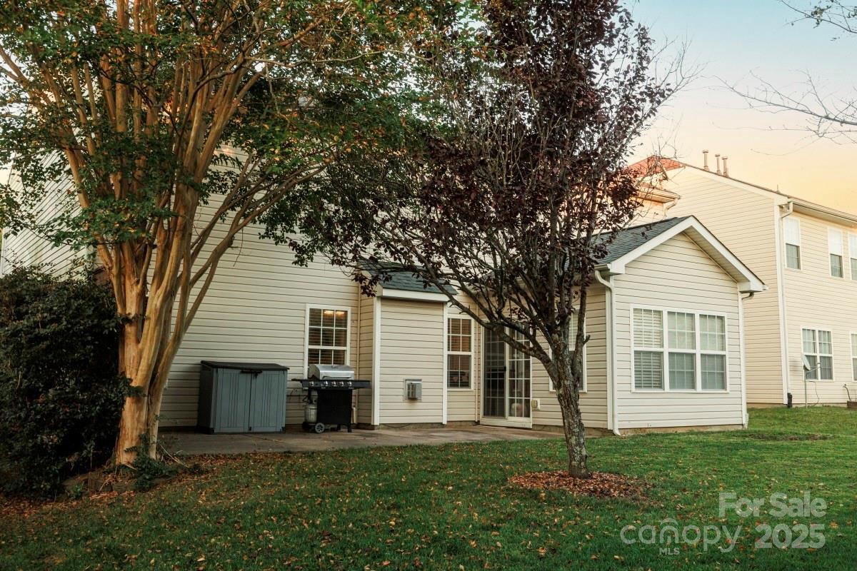1457 Prestbury Road Northwest Concord, NC 28027 - Photo 2 of 19 front view of a house and a yard