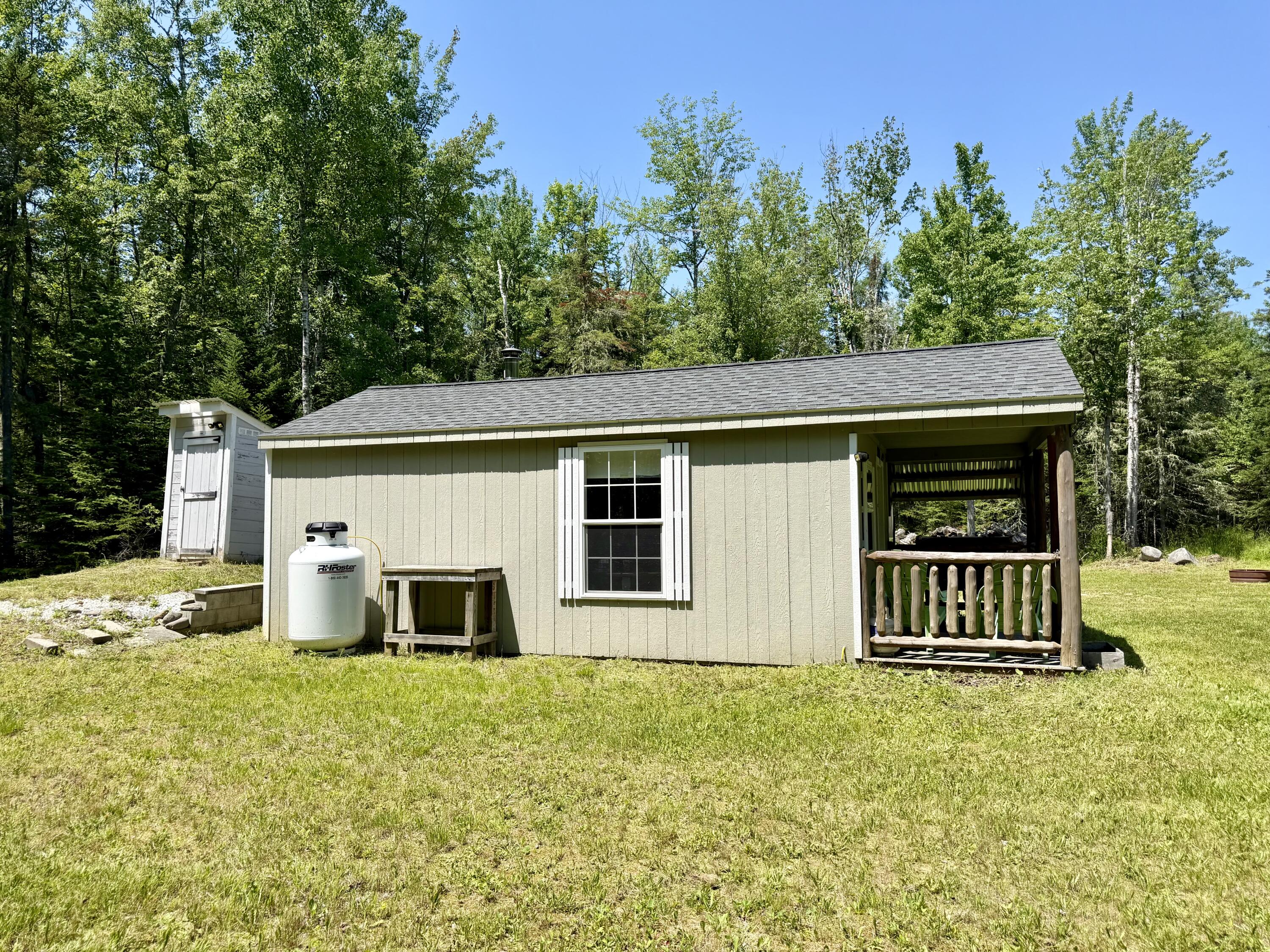 1053 Hudson Hill Road Hudson, ME 04449 - Photo 53 of 61 Side View of Cabin