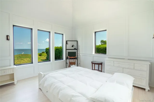 a view of living room with furniture and a fireplace