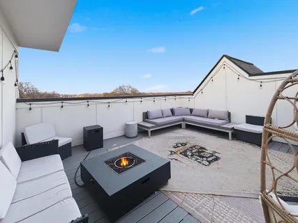 a view of a couch in the roof deck