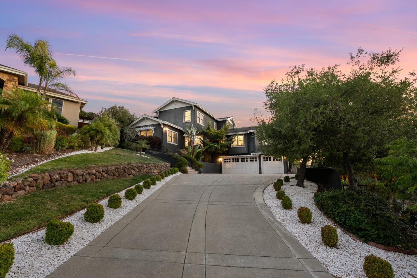 a view of a street with a building in the background
