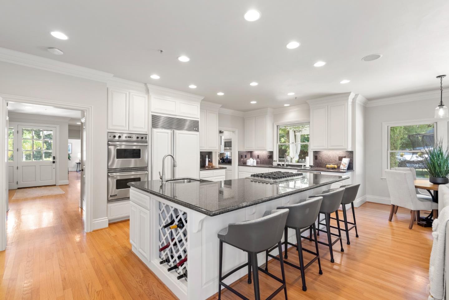 125 Dover Street Los Gatos, CA 95032 - Photo 15 of 49 a dining hall with stainless steel appliances granite countertop a sink and a refrigerator
