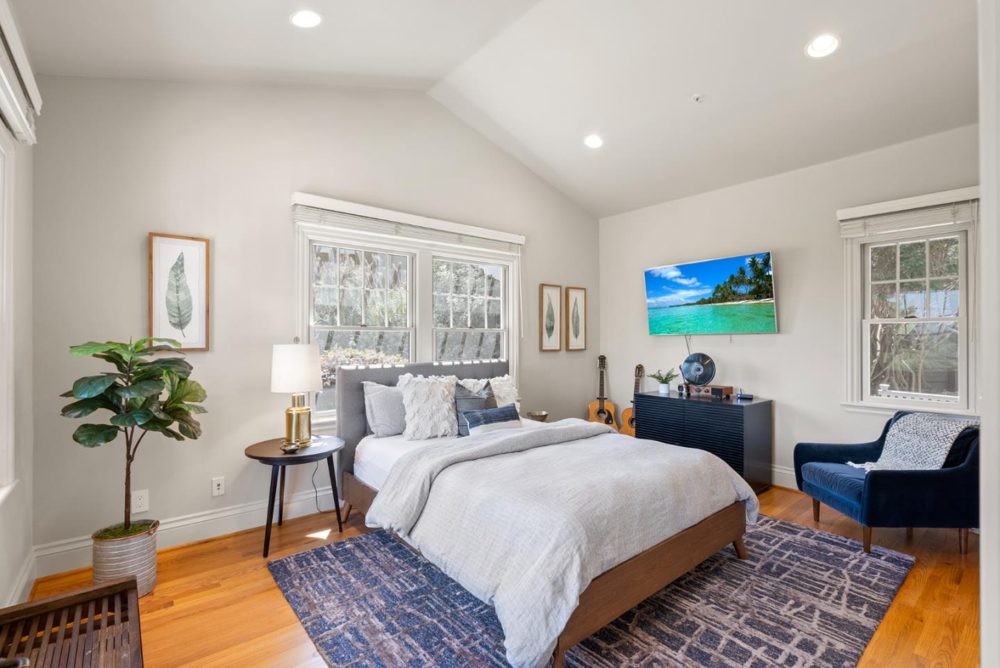125 Dover Street Los Gatos, CA 95032 - Photo 22 of 49 a bedroom with a bed a table and a potted plant