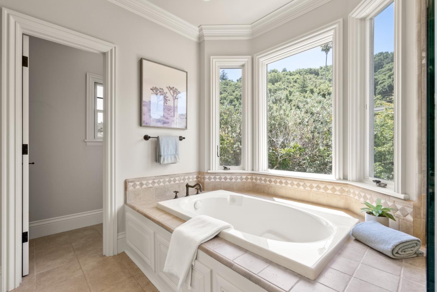 125 Dover Street Los Gatos, CA 95032 - Photo 29 of 49 a bath tub sitting in a bathroom next to a window