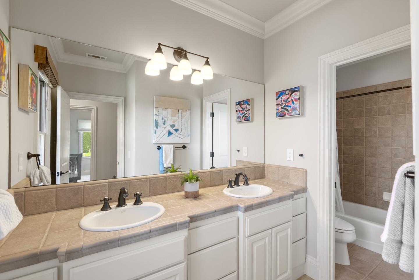 125 Dover Street Los Gatos, CA 95032 - Photo 30 of 49 a bathroom with a double vanity sink and a mirror