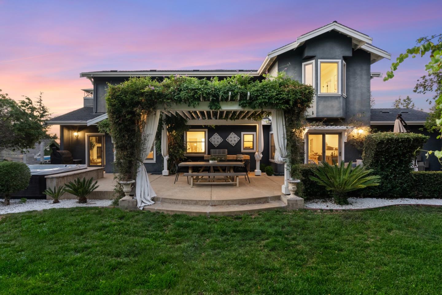 125 Dover Street Los Gatos, CA 95032 - Photo 3 of 49 a view of house with a yard and potted plants