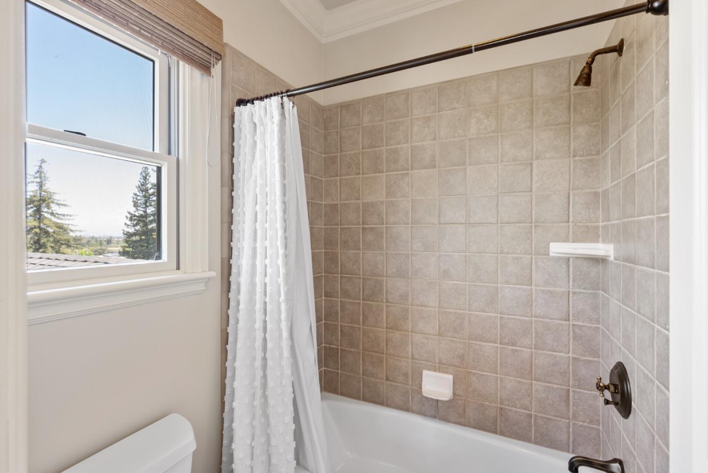 125 Dover Street Los Gatos, CA 95032 - Photo 31 of 49 a bathroom with a shower and a toilet