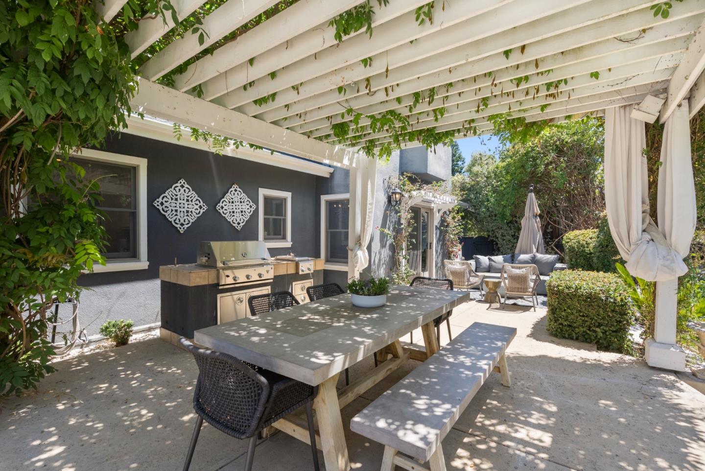 125 Dover Street Los Gatos, CA 95032 - Photo 37 of 49 a view of a dinning tables and chairs in a patio