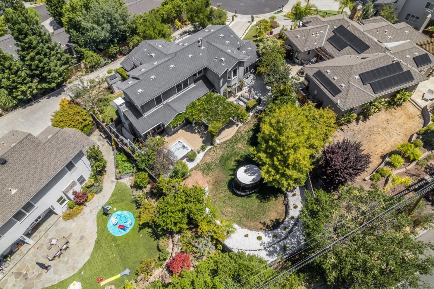 125 Dover Street Los Gatos, CA 95032 - Photo 44 of 49 an aerial view of a house with a yard and large trees