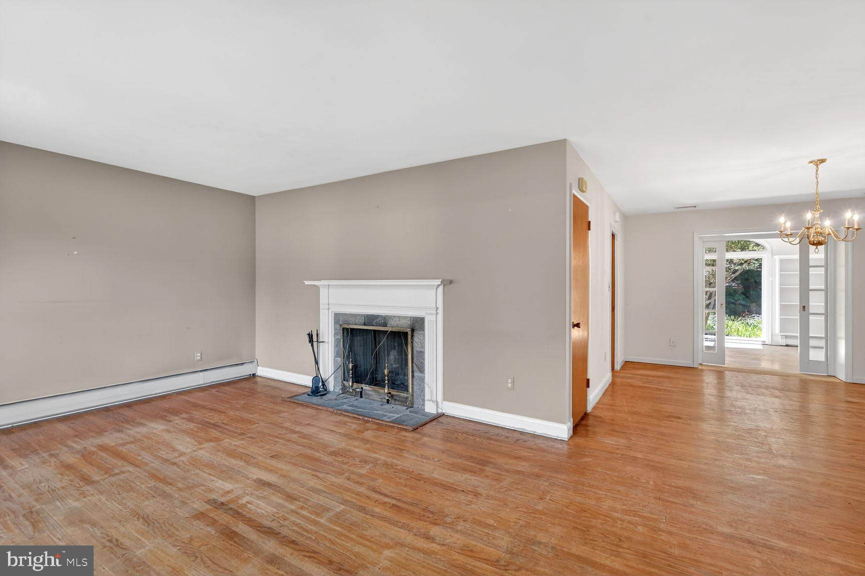 3029 Ramblewood Road Ellicott City, MD 21042 - Photo 5 of 21 Fireplace serves as a cozy focal point