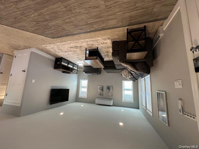 884 Beach Street Lindenhurst, NY 11757 - Photo 4 of 9 a living room with furniture and a flat screen tv