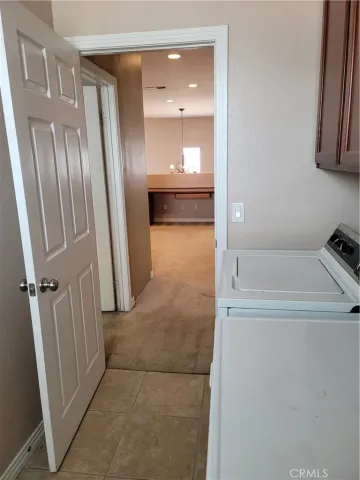 a bathroom with a tub and a sink