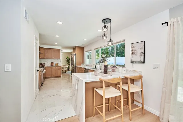 a view of a dining room with furniture