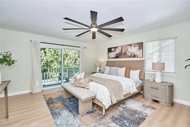 a bed room with a bed and a window