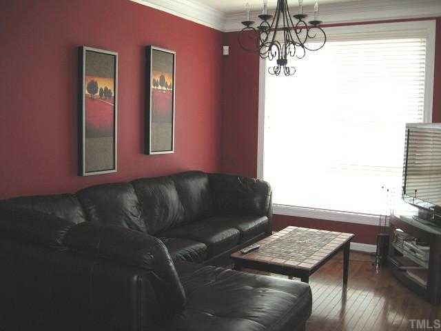 Great living room with drop-down molding & hardwood floor