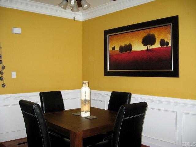 Lovely dining area with chair rail/wainscot