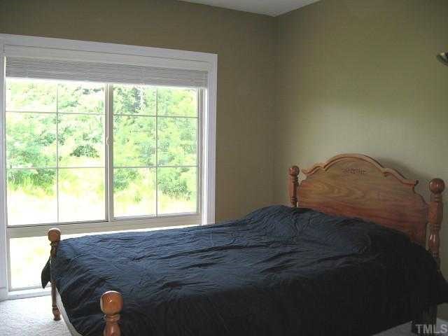 Master suite with large windows