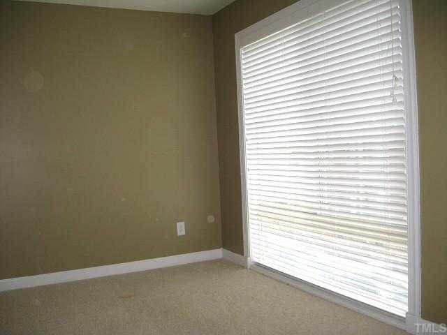 1230 Capability Drive, Unit 102 Raleigh, NC 27606 - Photo 8 of 12 Second bedroom with large window