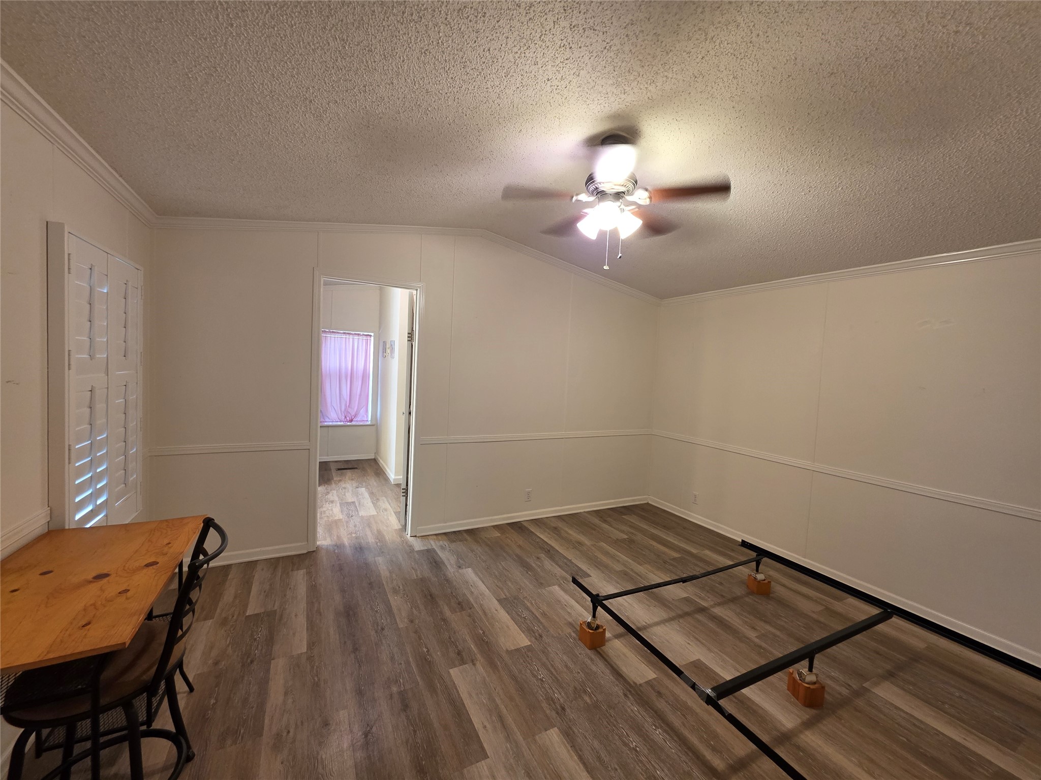 70 Montego Way Point Blank, TX 77364 - Photo 32 of 41 wooden floor in an empty room with a window