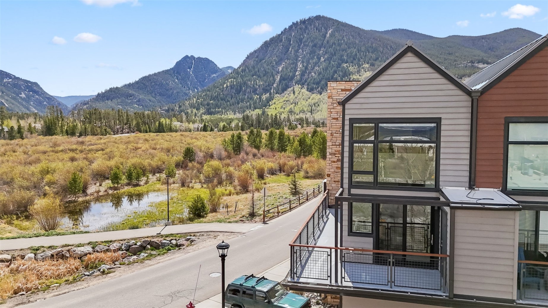 100 Basecamp Way, Unit 223 Frisco, CO 80443 - Photo 1 of 41 a view of a house with a mountain