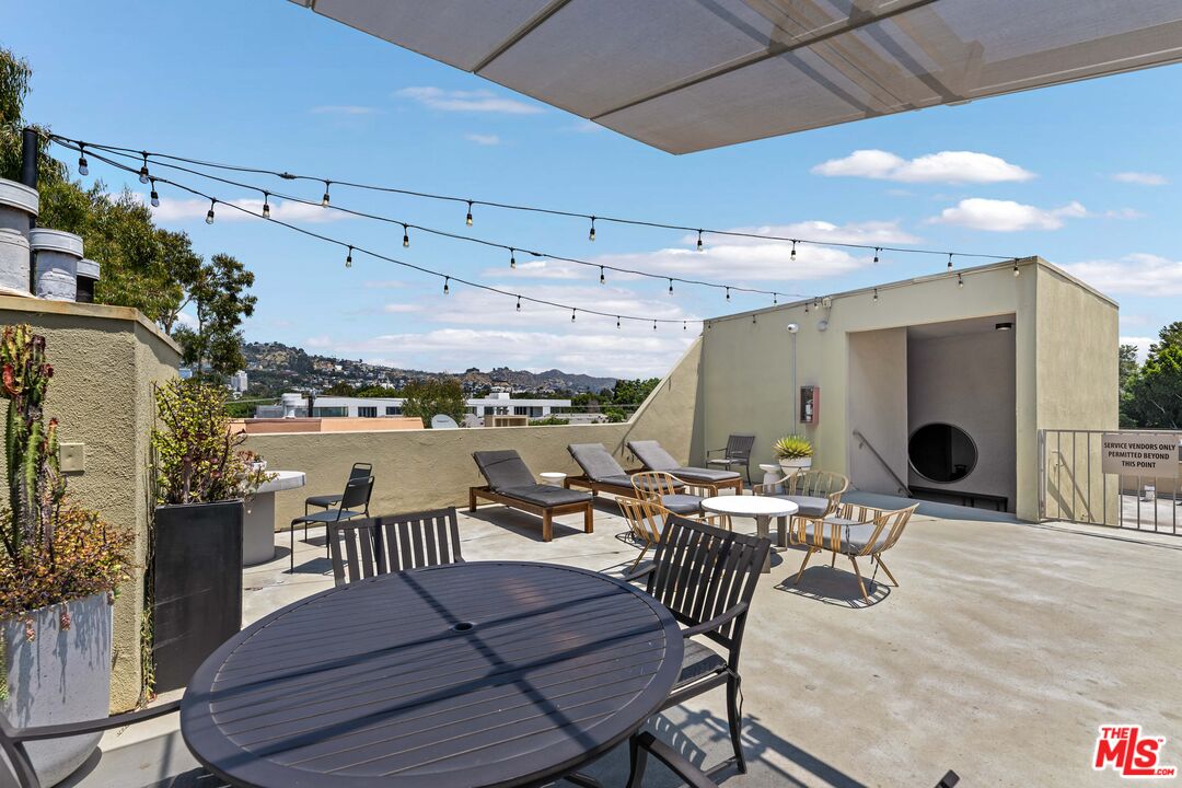 750 North Kings Road, Unit 204 Los Angeles, CA 90069 - Photo 22 of 23 a outdoor space with lots of seating space