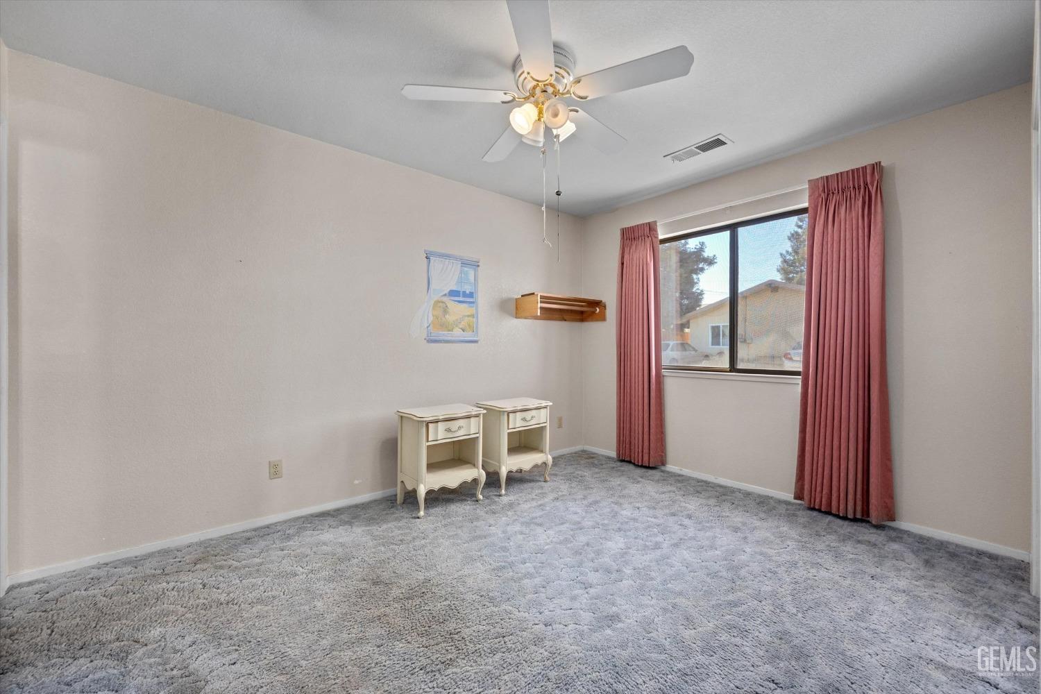 Undisclosed Address Chowchilla, CA 93610 - Photo 17 of 29 a view of workspace with chandelier fan