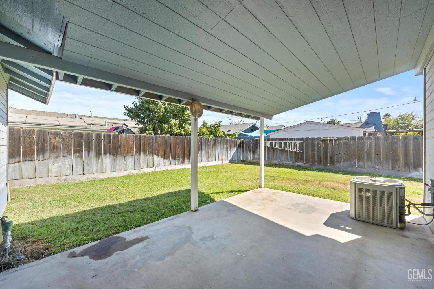 Undisclosed Address Chowchilla, CA 93610 - Photo 24 of 29 a view of a backyard with swimming pool and porch