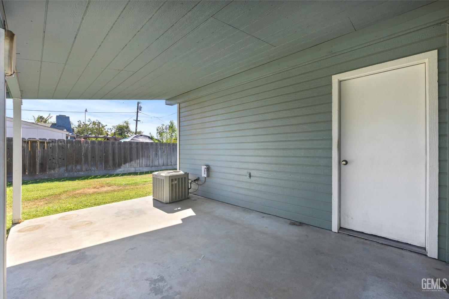 Undisclosed Address Chowchilla, CA 93610 - Photo 25 of 29 a view of a room with wooden walls
